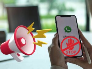 Smartphone WhatsApp simbolo megafono stop