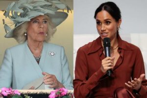 Camilla con espressione seria e Meghan con il microfono in mano