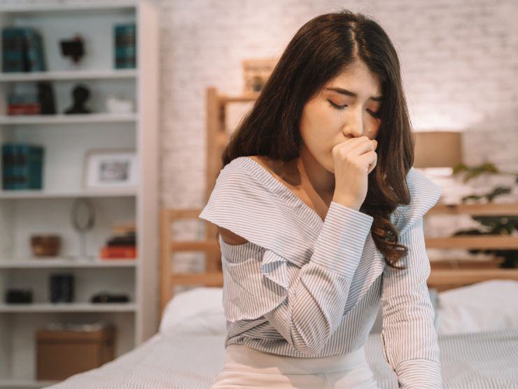 donna che tossisce